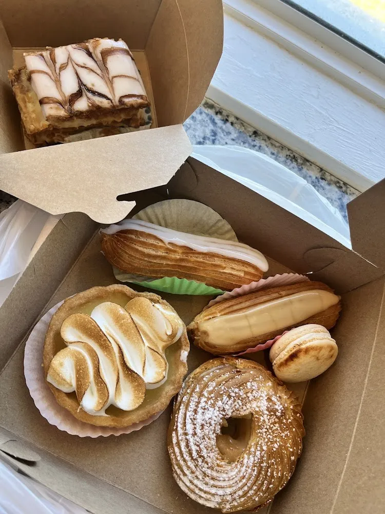 Lemon Tart Vanilla Eclair Coffee Eclair Macaron and Nutella Cream Puff